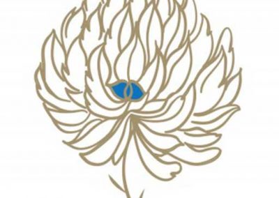 Logo Image for SMGraves Associates. Gold Clover blossom with small blue center.