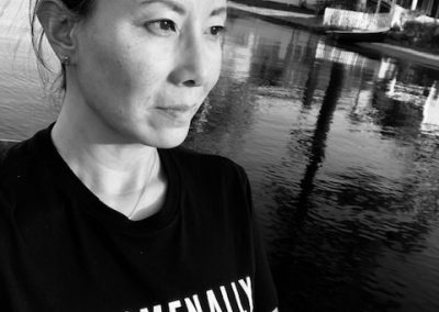 Headshot t of Ramona Piretti, Public Educator of English Literature in West Hartford, CT. Wearing T-shirt that reads, Phenomenally Asian.