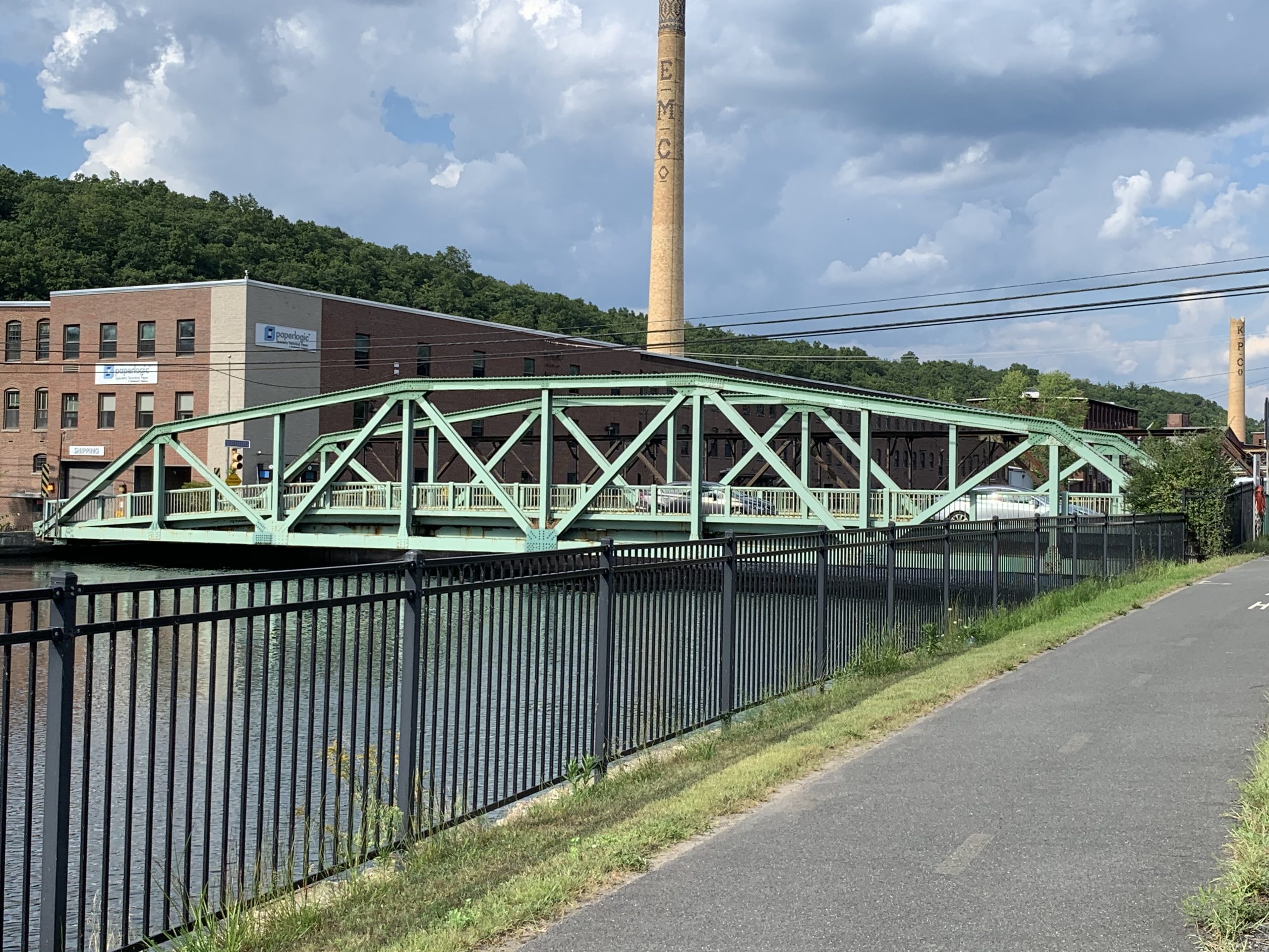 View looking east on the Canal Rail Trail, former industrial infrastructure, Turners Falls, MA