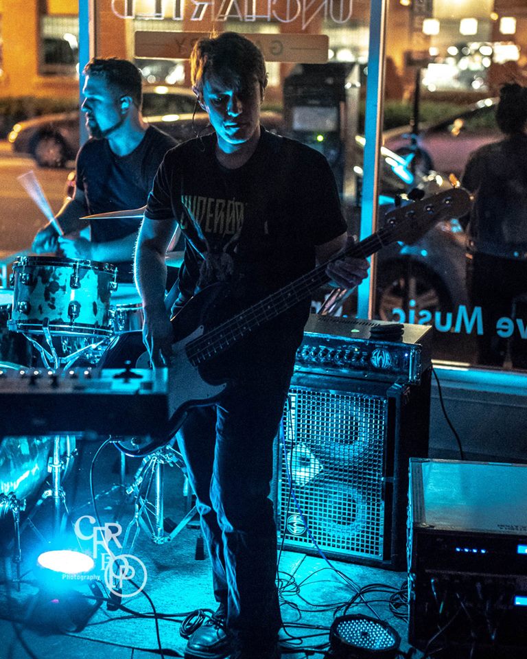 Stage Photo of Will Hunt, Bass Guitarist of the band Western Education performing in Lowell, MA