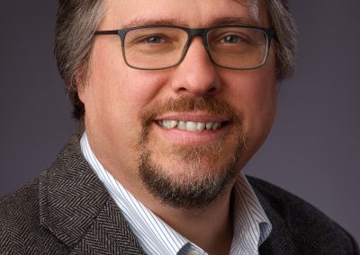 Full color Headshot of Author David Vermette