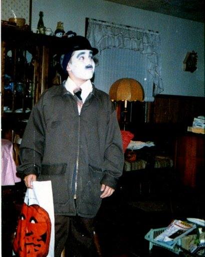 The Mental Suppository founding host Bret M. Herholz in a full color photo of himself dressed as Charlie Chaplin for Halloween sometime in the 1980's