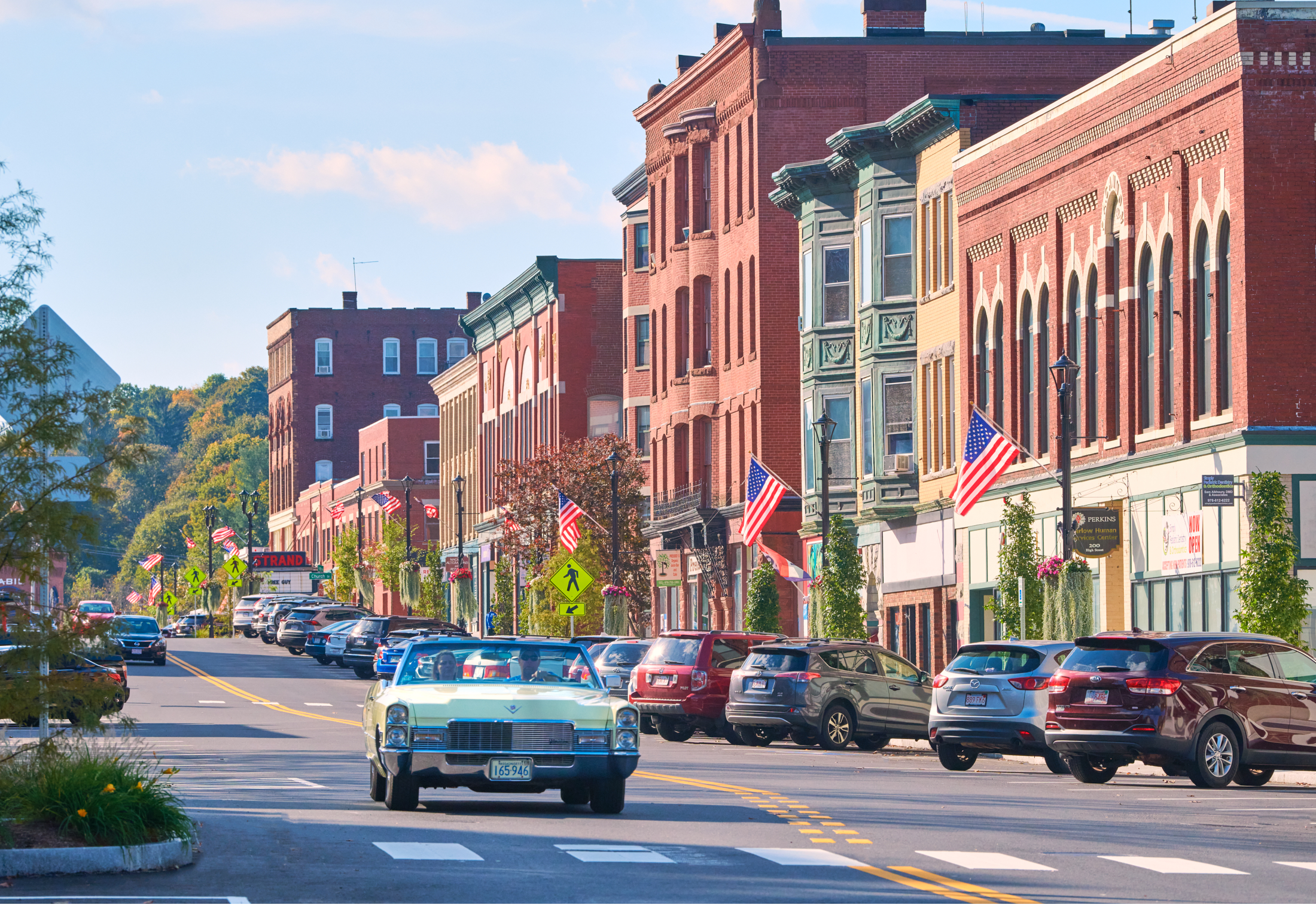 Street level full color phot of an intersection in the recently revitalized downtown of Clinton, MA