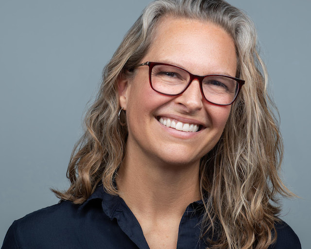 Full color headshot of Katie Stebbins, Executive Director Tufts University