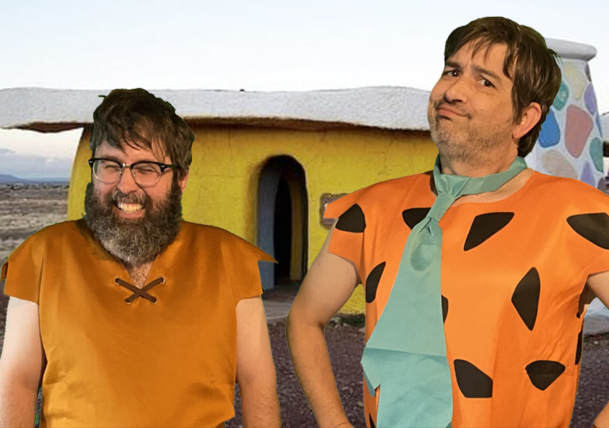Gag shot of host Bret Herholz dressed as Barny Rubble and Jamie Billings as Fred Flintstone from the Animated classic Flintstones.