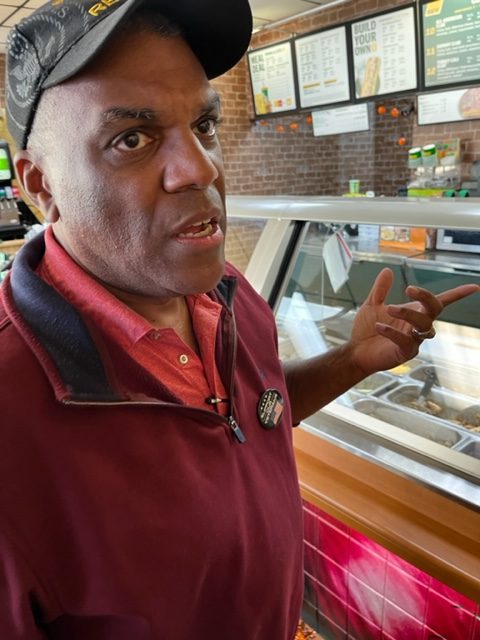 Co-Host of On The Rocks Politica and Candidate for MA House of Representatives Bruce Chester speaking to employees and small buisness owners in a sandwich shop in downtown Winchendon, MA. 