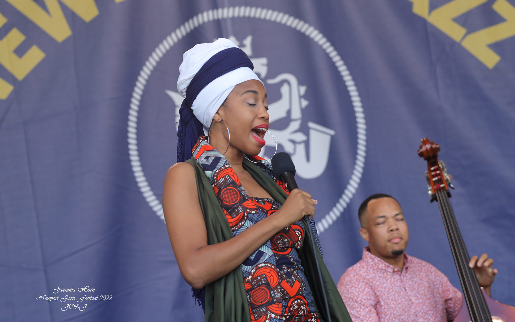 Jazzmia Horn signed small Ful color interior photo of Poet and Spoken Word artist Jessica Care Moore sitting alongside your host, Joan Watson-Jones.